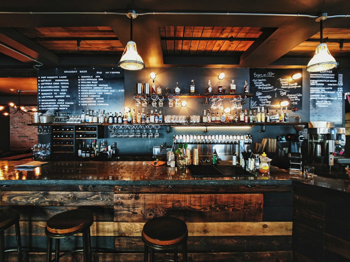 A warm restaurant bar with ambient lighting
